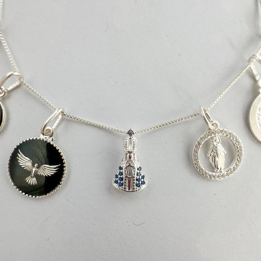 Pingente Nossa Senhora Aparecida Azul em Prata 925 Cravejada de Zircônias
